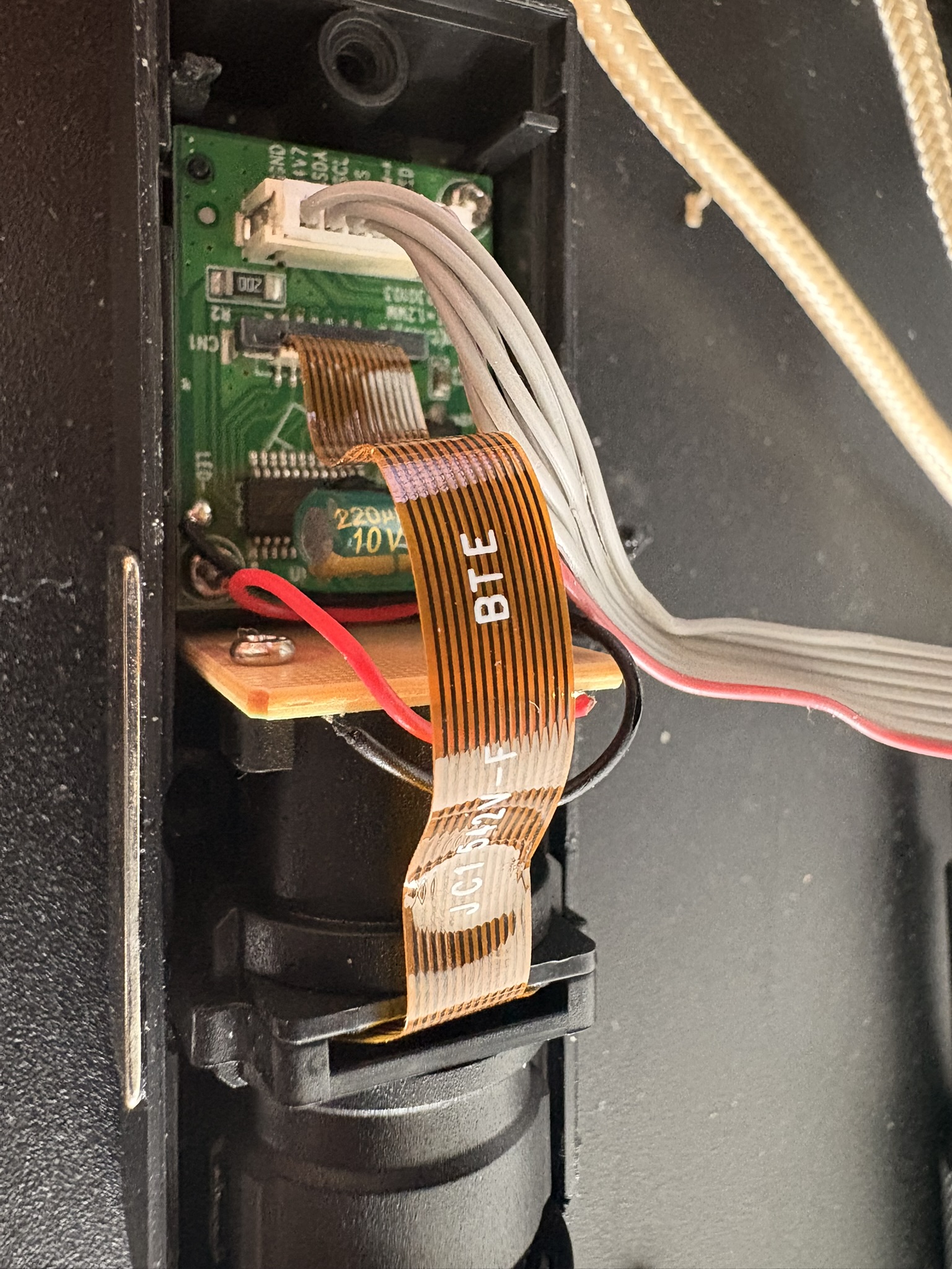 close-up of the PCB silkscreen showing the labeled pins — GND, 4.7V, SDA, SCL, CS, DIM-K, LED